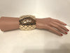 Gold caged cuff bangle