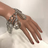 Silver link bracelet w/ oval rhinestone charm