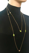 long gold chain wrap around w/ green stone