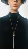 Long gold neckalce with heart tassel