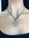 Silver rhinestone sailboat wheel