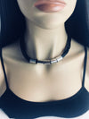 Black fabric cord necklace with silver hardware