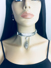 Silver herringbone choker with cafŽ loose stone leaf pendant