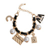 Gold and Black Perfume Charm Bracelet