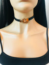 Black leather like choker with gold buckle